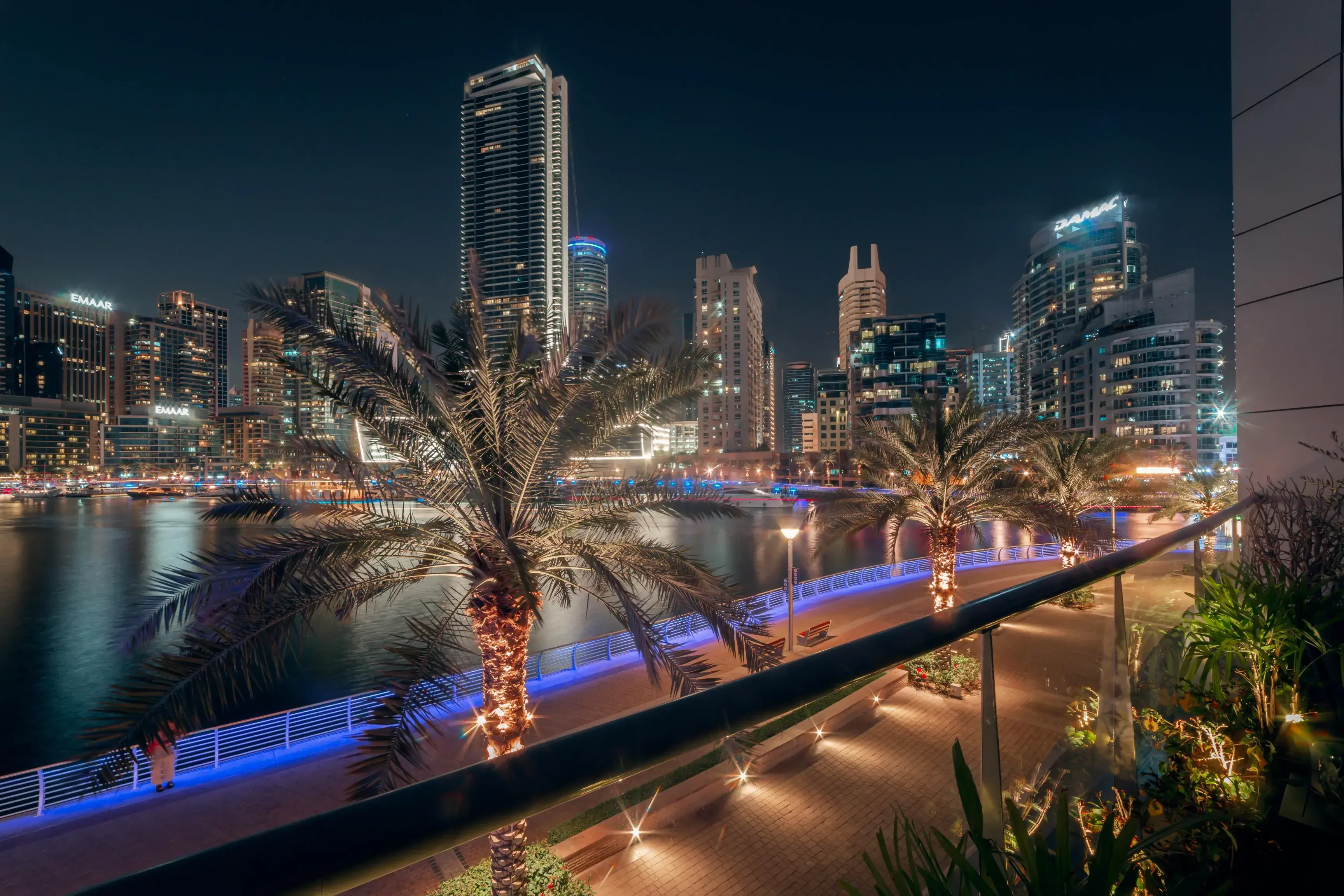 View Of The Marina And Illuminated Skyscrapers In Dubai At Night