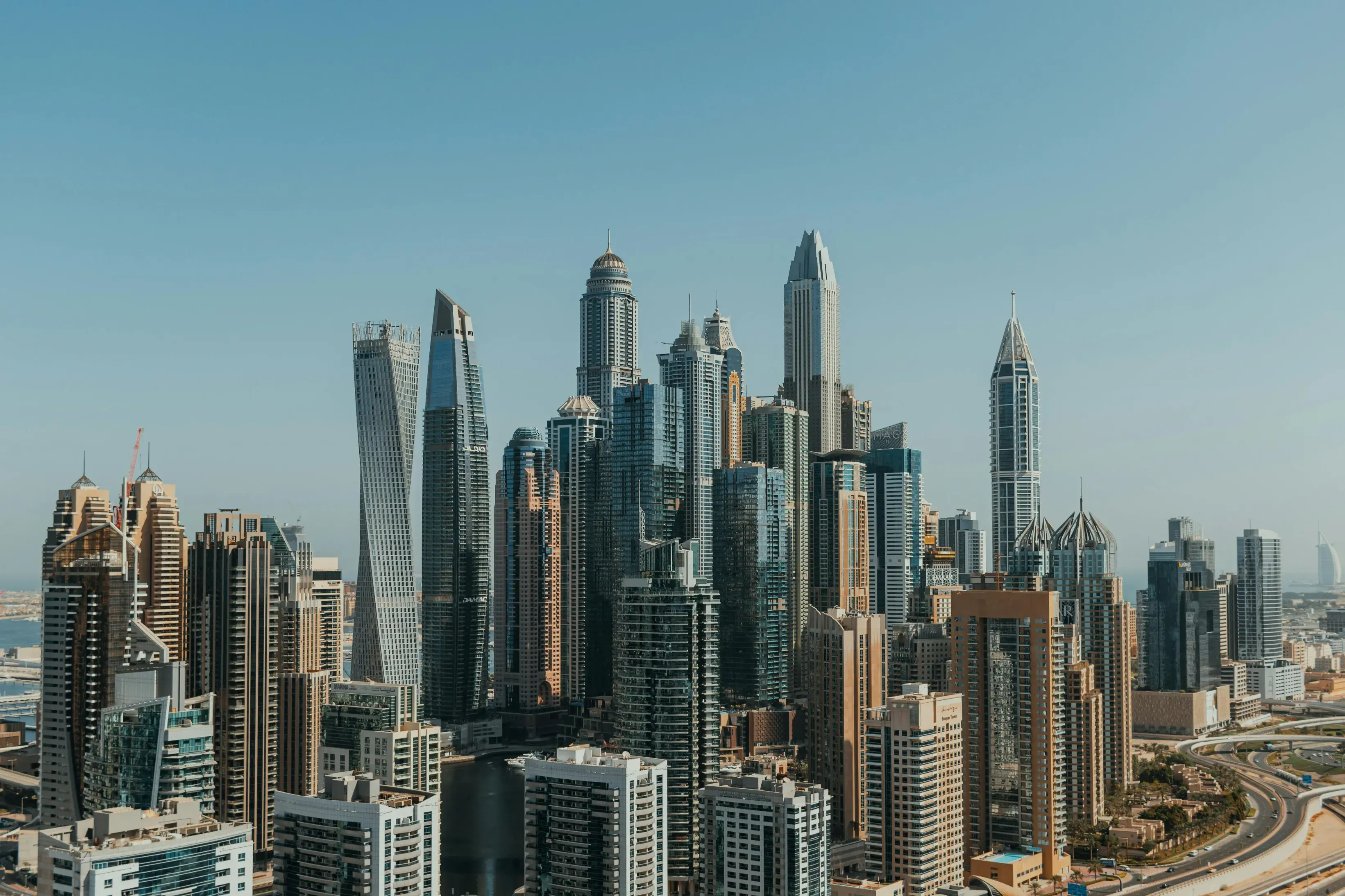 Stunning Panoramic View Of City Skyline With Skyscrapers And Blue Sky