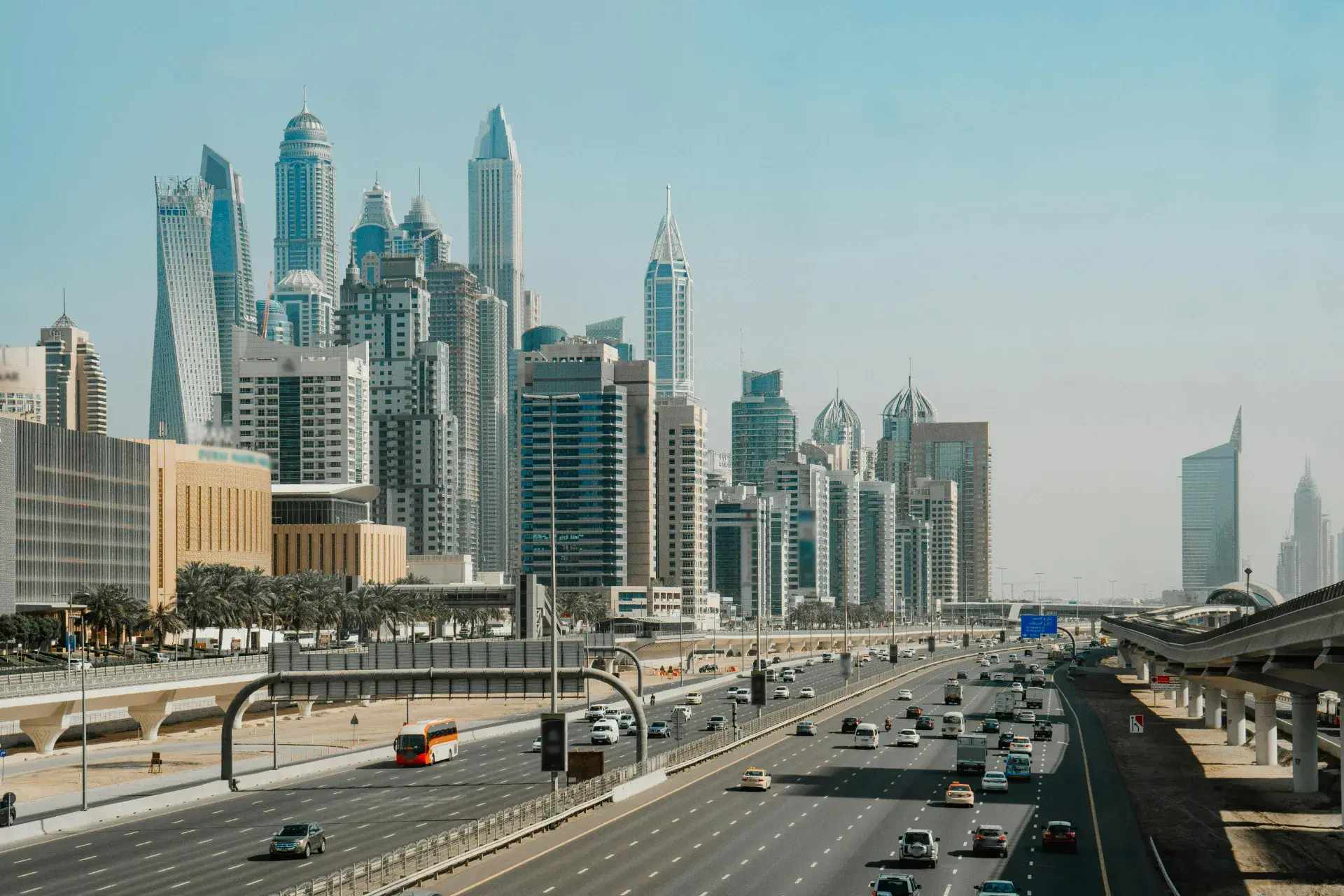 Cars On Road Near City Buildings Cropped